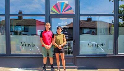 Caroline & Neil McBrearty outside their new carpet shop in Carlisle just after it had opened